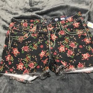 Flower pattern shorts.